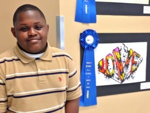 Fiery “Love” catapulted Andrezione “Dre” Perry, a 6th-grader at Gulf view Middle School into first place in the “Power of the Word” Art Exhibition's single word category.