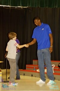 Eric_Shaking_Hands_Boy_with_Trophy_rIMG_0177