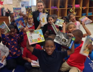 9 Operation Outreach - Cameryn Anthony with Kids and New Books 12-16-14 crop