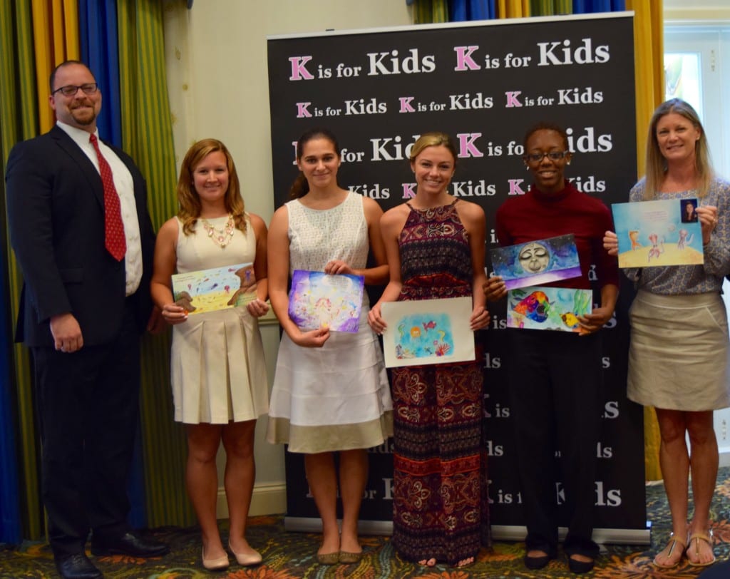 L-R: Jason Kurek, one of the judges for K is for Kids' Teen Illustrator Contest for children's book "White Moon, Purple Sea and the Underwater Circus" stands with the five finalists - Kaileen McHugh, Palmetto Ridge High School graduate; Kristina Cortada, a junior at Lorenzo Walker Technical High School; Celine Consolo, a Barron Collier High School junior; Darice Pollard, Naples High School graduate; and standing in for her daughter Sarah Renfroe is her mother Beth.