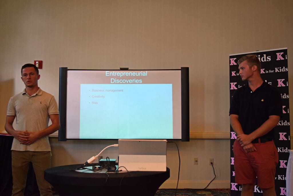 Finalists Tyler Schult (left) and Hadrien Roy, both recent graduates of Barron Collier High School, give presentations for the Y.E.S. Comp. (Young Entrepreneur Scholarship Competition)  on Sunday, May 31, 2015 at the K is for Kids Top Leaders Reception.