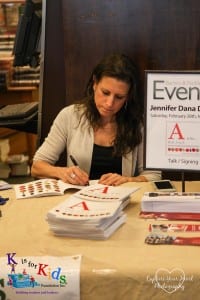 Jennifer Deane signing books