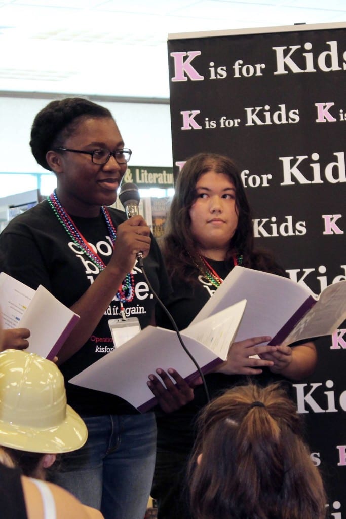 Sara Saintil takes the mike to speak to guests at K is for Kids' Book Fair, Setp. 2015