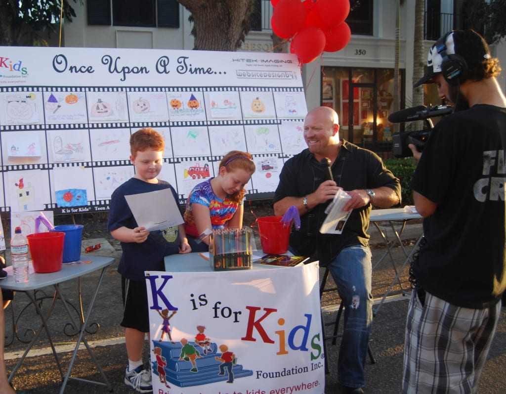 Chuck Ardezzone became an impassioned supporter of K is for Kids at CityFest 2010 when Naples International Film Festival invited our student leaders to participate in its "Films and Flavors" on Fifth Avenue. Here Chuck interviews children and teens participating in K is for Kids' "storyboards on canvas" event.