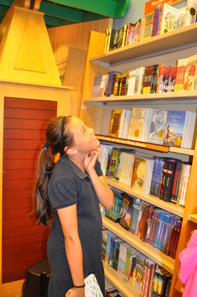 BN Girl looking up at books DSC_0912