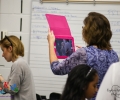 A mom backstage watches daughter getting ready